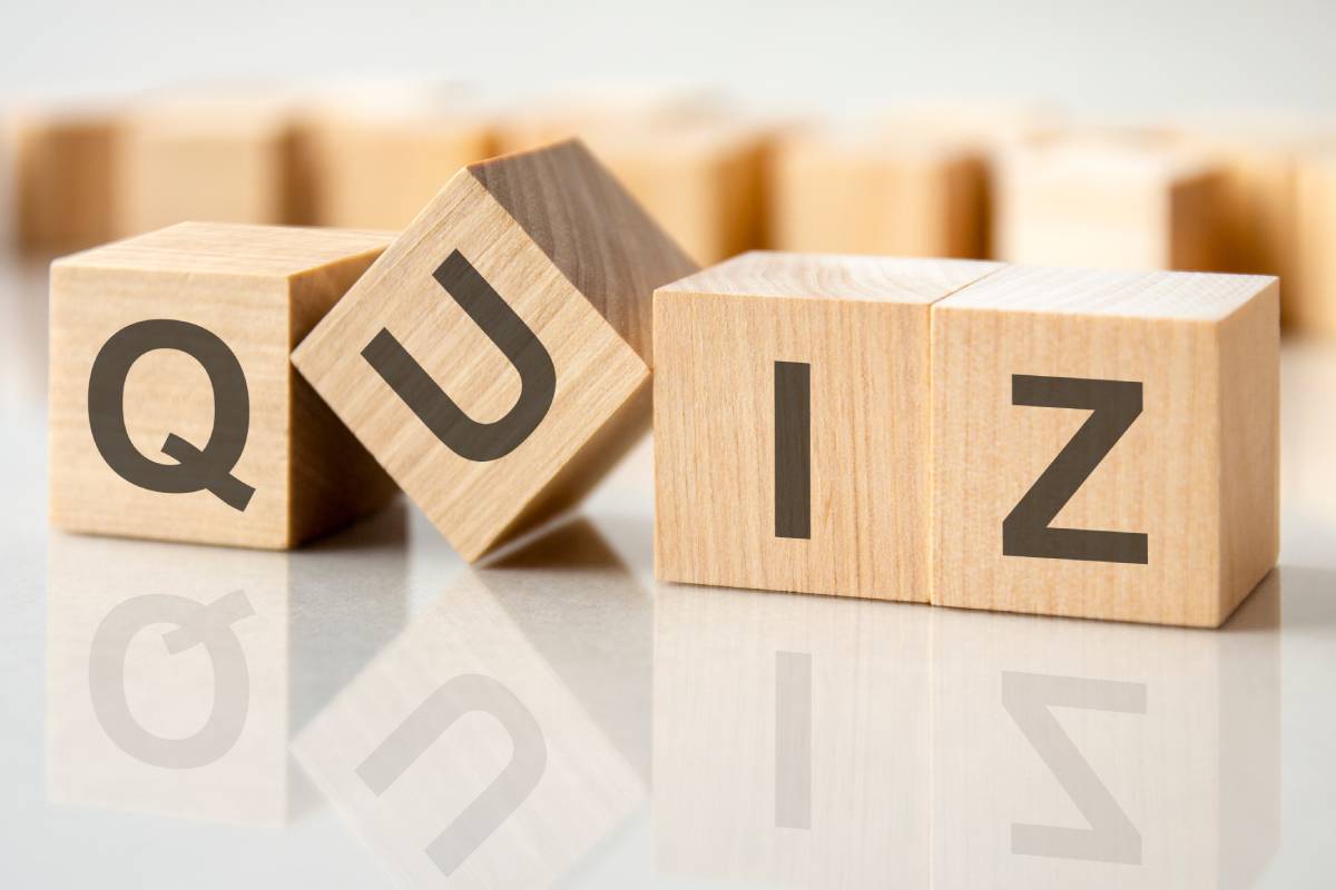 The AC Quiz team working together around a table