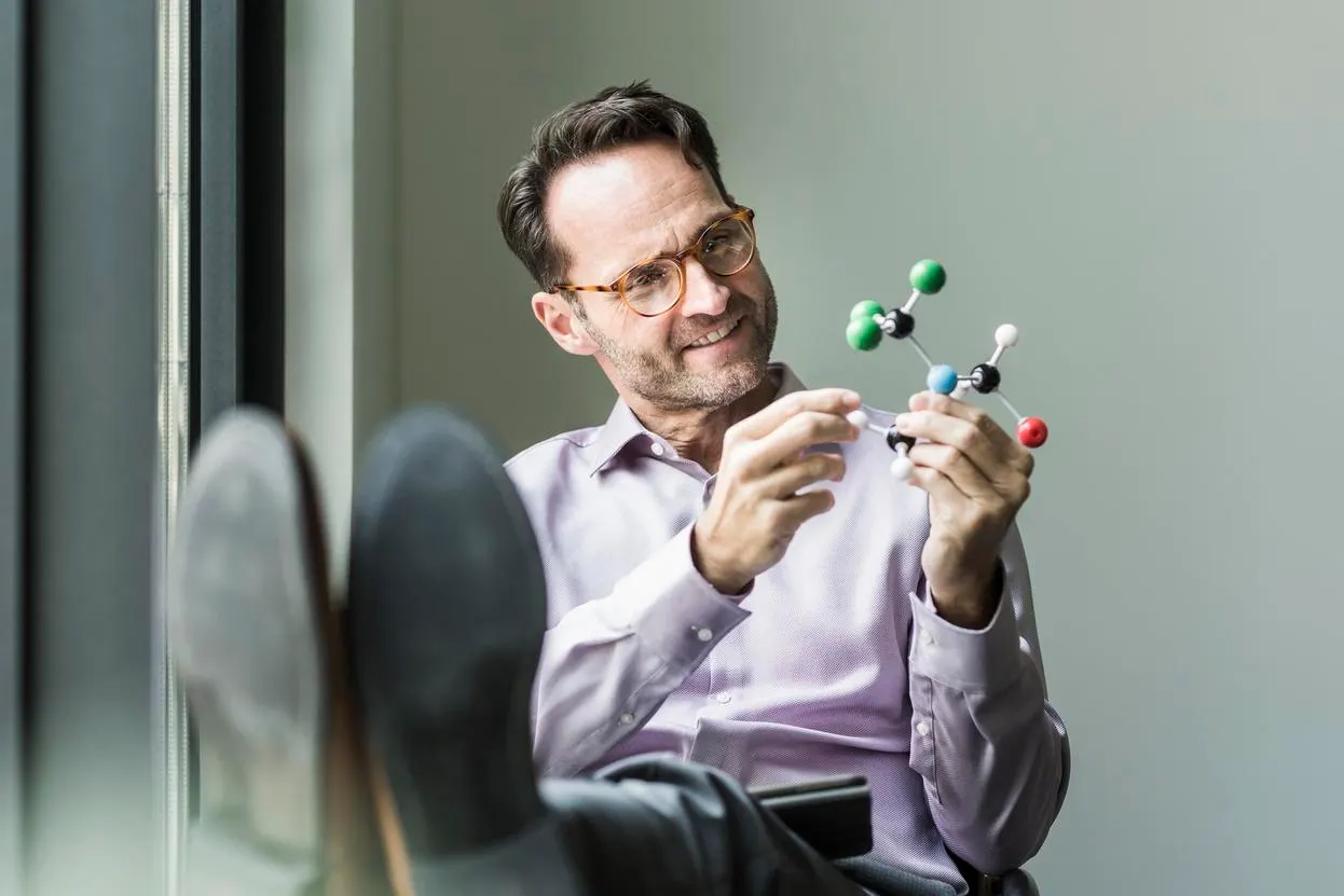 Child reading a book with wonder and curiosity